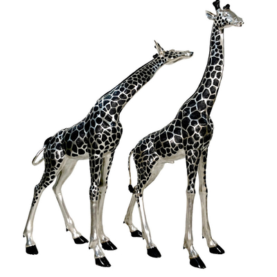 Mat roestvrij staal giraffe beeldhouwwerk paar elegant abstract duo voor moderne tuinen